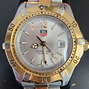 Tag Heuer Professional 200 meter white face watch with Gold bezel 2 tone band